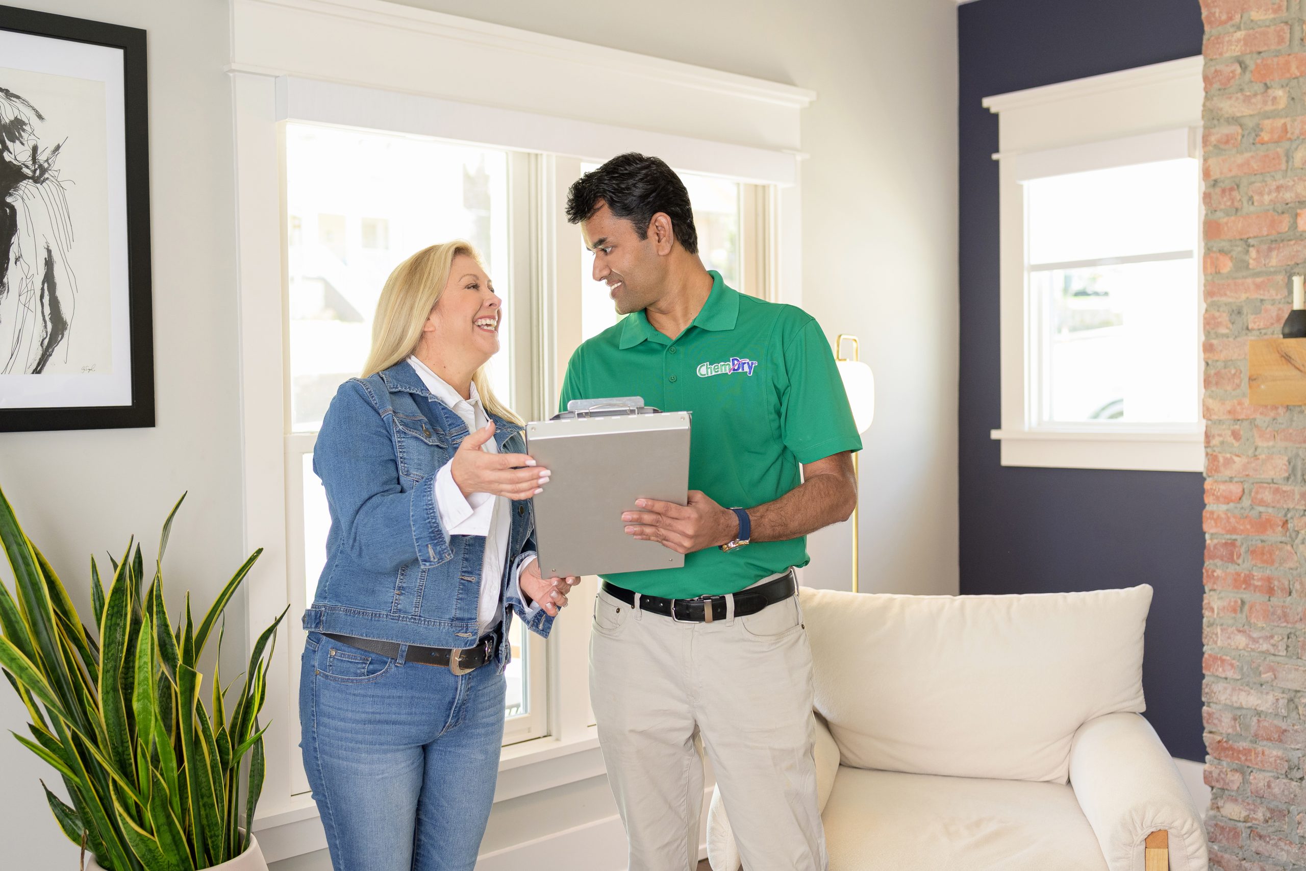 Why Chem-Dry is right for you. Image of a friendly technician meeting a happy customer.